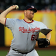 Todd Coffey in 2011, showing the scar from his first Tommy John surgery. (Chris Trotman/Getty Images)